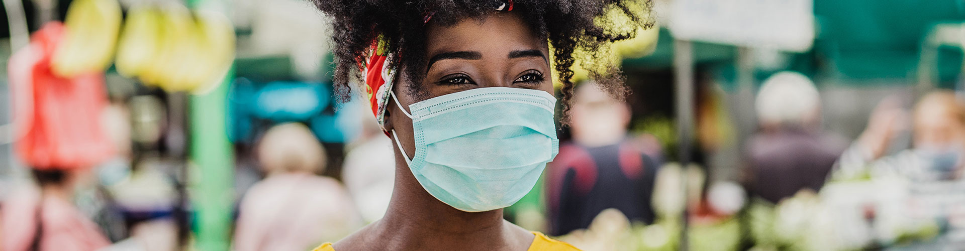 How Do Retailers Win Minorities’ Trust? By Doing Something blog banner featuring masked young black woman standing in a plaza