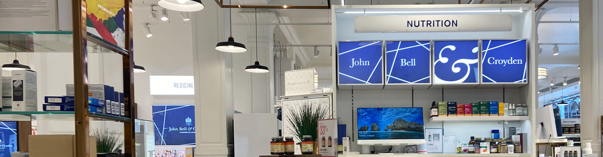 Retailers & Brands Embracing the Big Business of WELL Report Banner featuring nutrition booth at John Bell & Croyden store